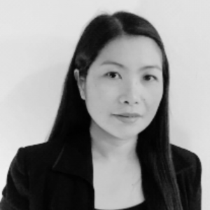 black and white photo of woman wearing a black blazer